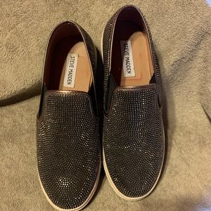 Steve Madden “Exsess” black rhinestone sneaker.